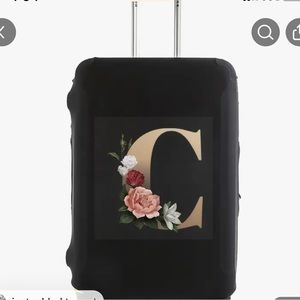 Suite case or luggage cover with a letter C for your name. It’s stretchy.